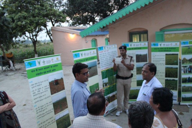 Pic: 2: R K Jat explaining conservation agriculture practices at BISA farm, Pusa  to the Agriculture Production Commissioner (photo taken by Deepak)